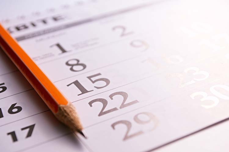 Company earnings calendar and pencil