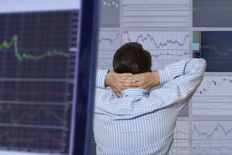 Tense options trader watching market
