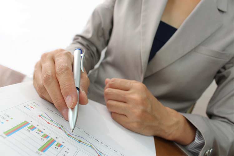 Female options trader analyzing